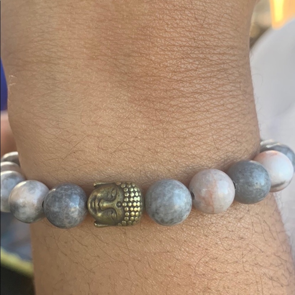 Buddha head pink and gray lava bracelet